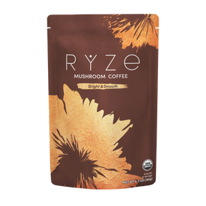 RYZE Mushroom Coffee package with palm tree design on a white background