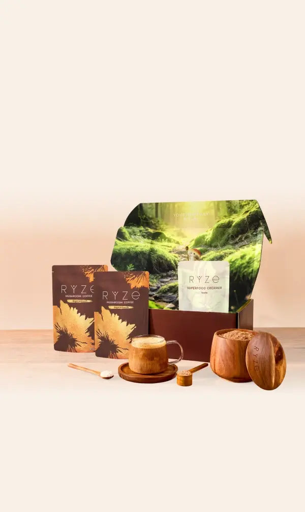 Ryze coffee packaging with a scenic design on a wooden surface